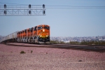 BNSF 7803 roars east out of Barstow, Californis (In the background) with 7 other GE locomotives pulling a Hot Z train east towards Winslow, AZ for another crew change.